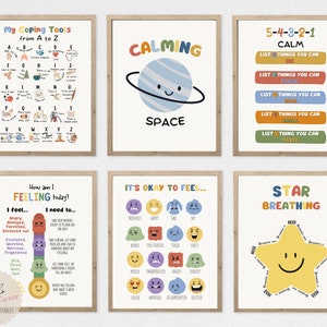 Könnte beinhalten: Sechs gerahmte Kunstdrucke mit beruhigenden Themen. Die Drucke zeigen farbenfrohe Illustrationen und Texte, darunter "My Coping Tools", "Calming Space", "5-4-3-2-1 Calm", "How am I Feeling Today?", "It's Okay to Feel" und "Star Breathing".