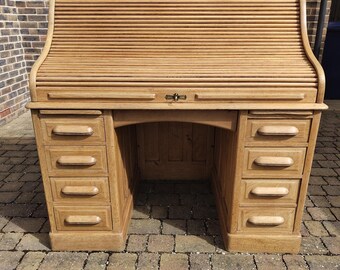 A splendidly restored oak roll-top desk, with superb quality oak. A wonderful antique to enjoy and use.         UK BUYERS ONLY.