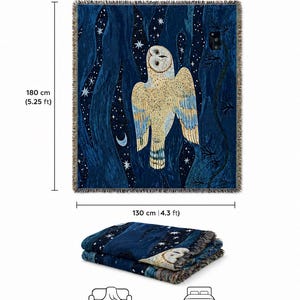 May include: A dark blue throw blanket with a large owl design, measuring 180 cm (5.25 ft) by 130 cm (4.3 ft). The owl is cream and blue, set against a starry night sky. The blanket is folded at the bottom, with the words "Sofa Throw" and "Bed Runner" below.