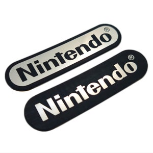 Adesivo Nintendo Custodia Distintivo Decalcomania Aufkleber - Due Emblemi
