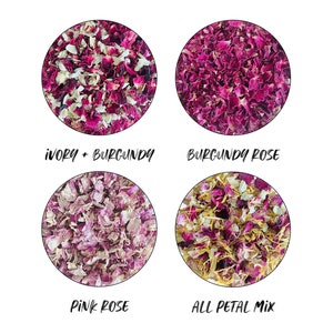 May include: Four containers of dried rose petals in different colours: ivory and burgundy, burgundy, pink, and a mix of all three colours. The containers are labelled with the colour combinations.