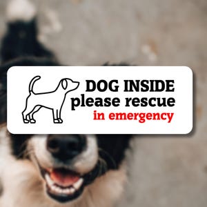 May include: White sticker with black text and a black line drawing of a dog. The text reads "DOG INSIDE please rescue in emergency".