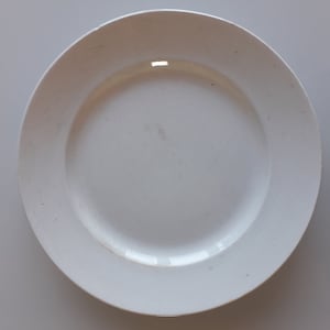 Opaque earthenware dish from LUNEVILLE - Signed K&G