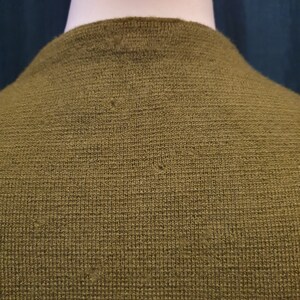 Small holes through the garment
