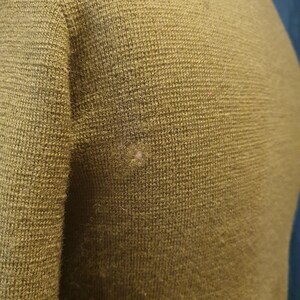 Small holes through the garment