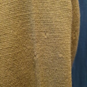 Small holes through the garment