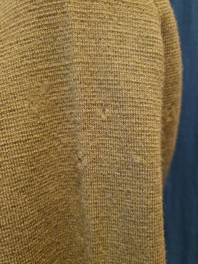 Small holes through the garment