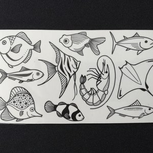 Sheet of temporary fish tattoos