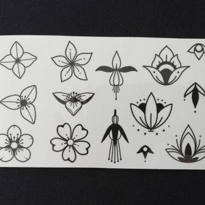 Sheet of temporary flower tattoos