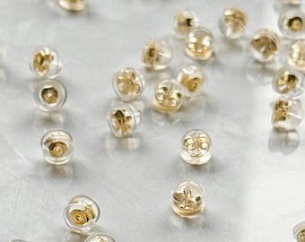 100 tapones/soportes de silicona para pendientes de mariposa chapados en oro de 18 quilates