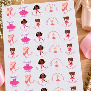 May include: A white sticker sheet featuring multiple circular labels with ballet-themed illustrations. Designs include pink ballet slippers with the text On Point!, a pink tutu with Beautiful Ballet, a dancer with Dancing star, and Well done.