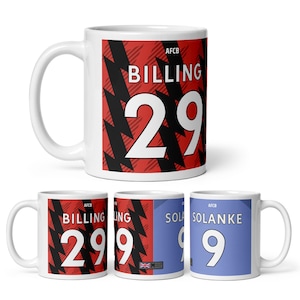 May include: Three white ceramic mugs with black and red designs. The mugs feature the text "Billing 29" and "Solanke 9" with the team logo.