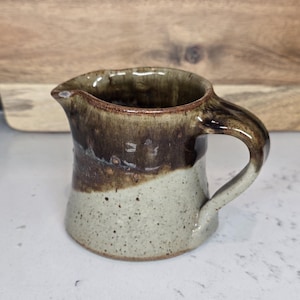 handmade studio pottery creamer or pitcher.
