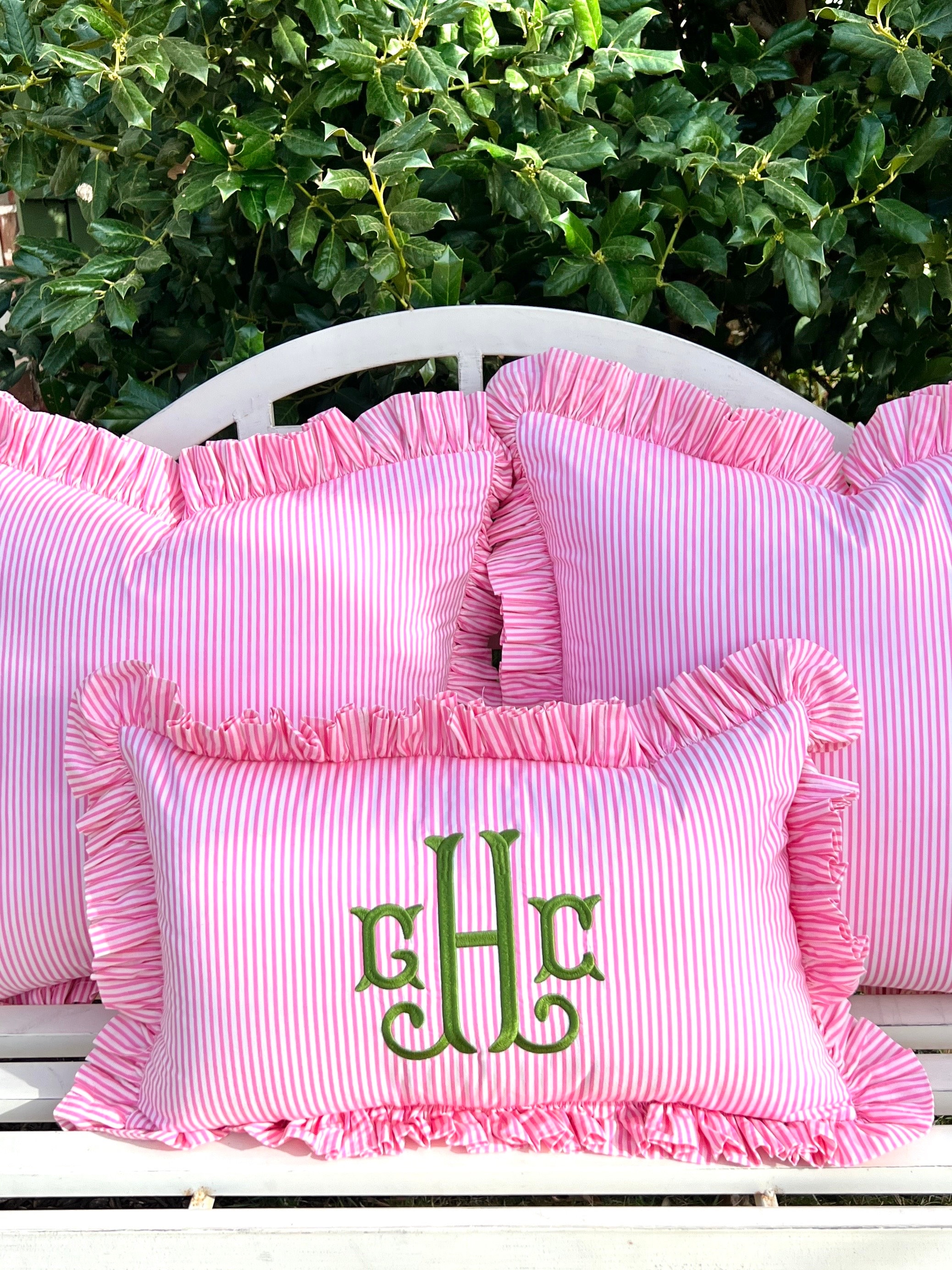 Pink and white striped pillow deals