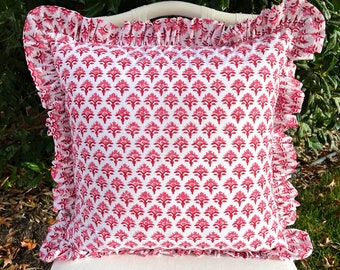 Red and pink block print pillow cover with ruffle trim