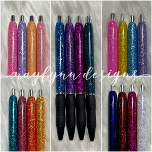 May include: Set of 12 glitter pens with various colors, including pink, purple, blue, green, orange, yellow, red, and white. The pens have black, textured barrels and silver caps.