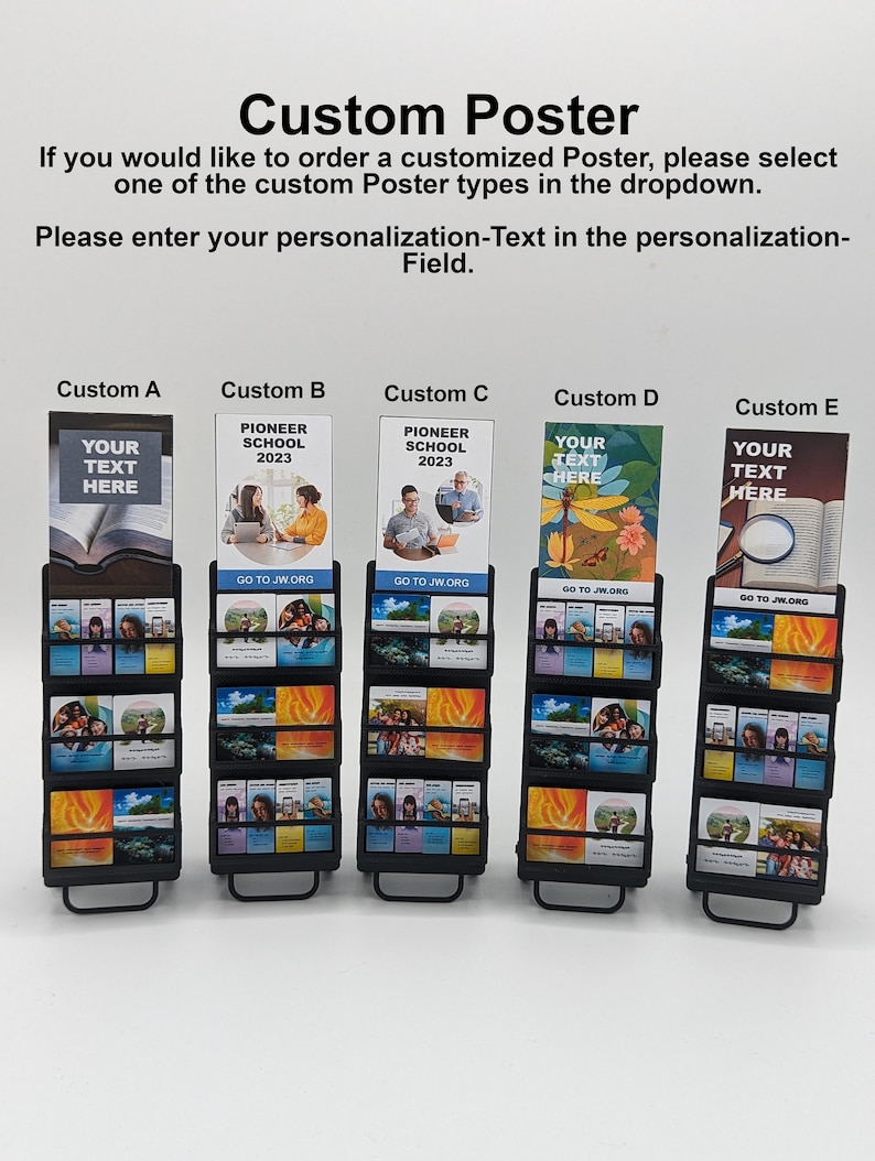 May include: Five black poster stands displaying posters and brochures. The top posters are labelled "Custom A" to "Custom E", with text including "Your Text Here" and "Pioneer School 2023". Smaller brochures are also visible on the stands.