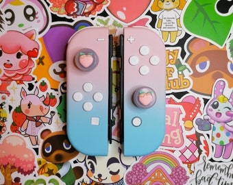 Joy-Cons para Nintendo Switch com visual Animal Crossing