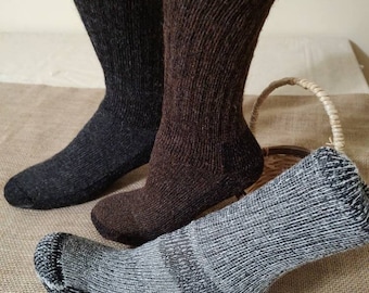 May include: Three pairs of wool socks in brown, black, and gray. The socks are made of a soft, comfortable material and are perfect for keeping your feet warm in cold weather.