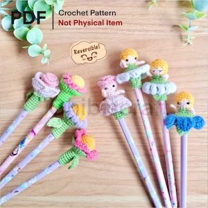 May include: A collection of crochet pencil toppers, including flowers and doll figures. The toppers are in various colors, such as pink, yellow, green, and blue. The pencils are decorated with a pastel pattern. The image includes text that says "Crochet Pattern Not Physical Item".