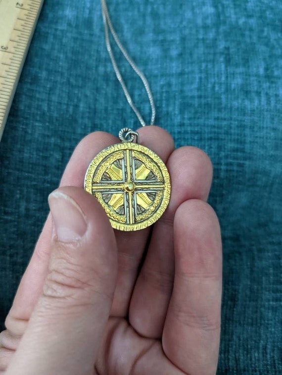 Stunning Sterling Silver pendant necklace with gold embellishments