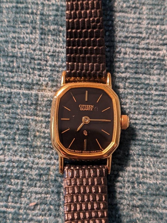 Vintage, working, elegant, black and gold tone lad