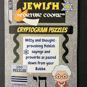 May include: A book cover with a gray background and a black title that reads "Jewish "Fortune Cookie" Cryptogram Puzzles". The cover also features a cartoon image of a woman with gray hair and glasses, a Star of David, and a Hebrew letter.