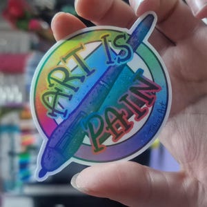 Art is Pain holografische sticker digitaal Artis cadeau