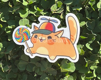 Sticker chat voiture Yippee : chapeau à hélice orange en forme de sucette