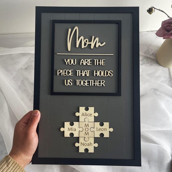Personalisiertes Mom Puzzle-Schild mit Kindernamen-Hauswanddekor für Geschenkideen zum Muttertag, Du bist das Stück, das uns zusammenhält