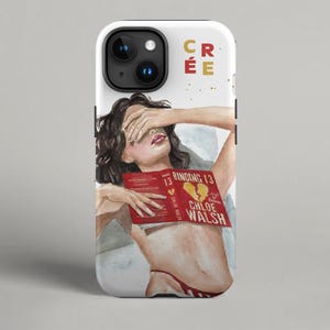 May include: A white iPhone case featuring a watercolour illustration of a woman with her eyes covered by her hands. She is holding a red book titled "Binding 13" by "Chloe Walsh". The text "Crée" is written in gold lettering on the case.