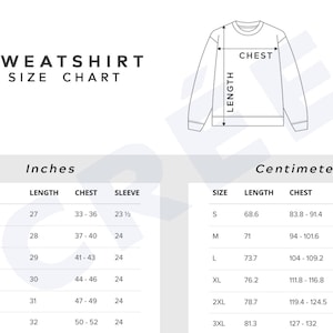 May include: A white size chart for sweatshirts, displaying measurements in inches and centimeters. The chart includes size, length, chest, and sleeve dimensions for sizes S through 3XL. A diagram of a sweatshirt is also included.