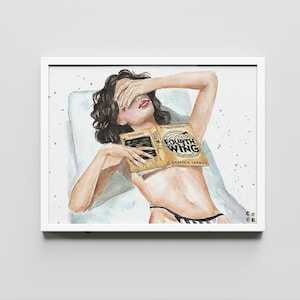 May include: Watercolor print of a person reclining and holding a book titled "Fourth Wing" by Rebecca Yarros. The person is wearing a black and white striped bottom and has their eyes covered with their hand. The artwork is framed in a white border.