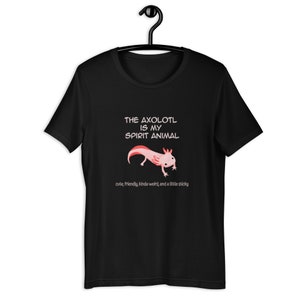 May include: Black t-shirt with a pink axolotl illustration and the text "THE AXOLOTL IS MY SPIRIT ANIMAL cute, friendly, kinda weird, and a little sticky"