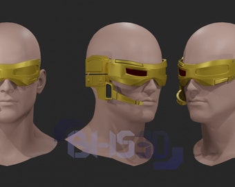 May include: A 3D model of a head wearing a gold and red visor with a side-mounted microphone. The visor has a futuristic design and is likely a prop for a science fiction film or video game.