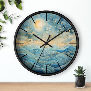 May include: A black framed wall clock with a blue and gold abstract design of waves and a sun. The clock face has black hands and black Roman numeral markings.