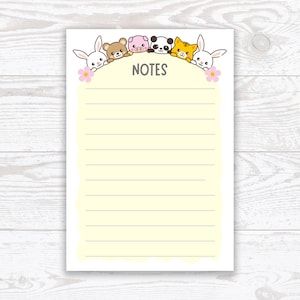 Puede incluir: Un bloc de notas amarillo con líneas y la palabra "NOTES" en la parte superior. Una fila de animales de dibujos animados, incluyendo un conejo, un oso, un cerdo, un panda, un gato y otro conejo, están mirando por encima del bloc de notas.