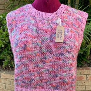 Hand knitted vest. We hand knitted this wool/acrylic vest using a soft fluffy yarn featuring a gold fleck making this a beautiful garment. image 1