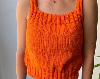 Hand knitted orange vest with thin straps.  Part of our new SUMMER VEST COLLECTION.  Bright, fresh and perfect for an Aussie summer.