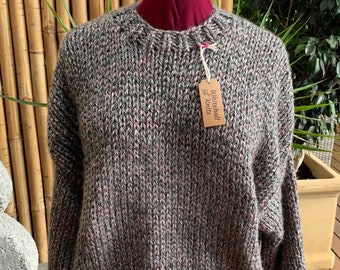 Hand made jumper. We hand knitted this garment in easy care acrylic.  Variegated black/grey/pink will be a star in your wardrobe.