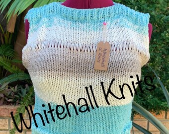 Hand made Ladies cotton Vest. We hand knitted the vest in a cotton acrylic blend.  Blended colours and boat neck design.