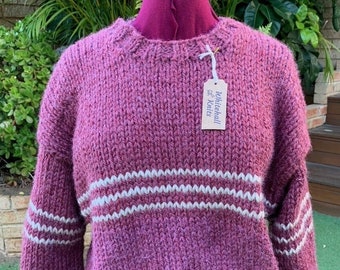 Hand made jumper. We hand knitted this garment in 100% recycled polyester yarn. Soft easy care yarn that's helping save the environment.