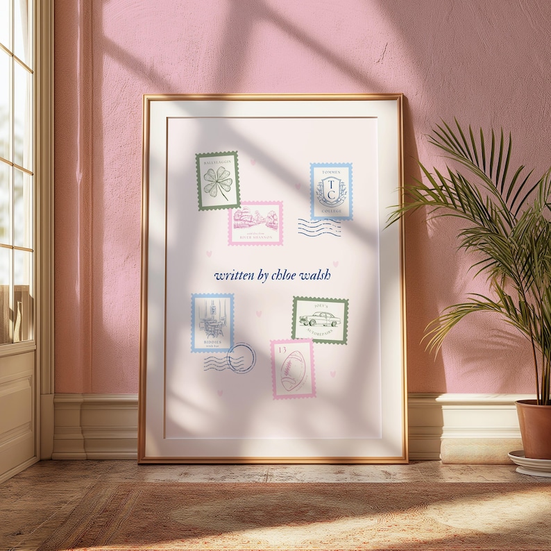 May include: A framed print with a white background and a light pink border. The print features a collection of six vintage postage stamps with illustrations of a four-leaf clover, a building, a car, a crest, a building, and a bird. The text "written by chloe walsh" is printed in blue below the stamps.
