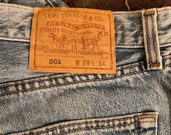 Levis 501 jeans button fly, vintage used, size 29 inch waist, 34 inch length, previously worn, in great condition, pair number 4
