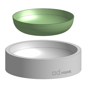 May include: A light green, bowl-shaped object is suspended above a gray, cylindrical base. The base has a circular indentation and the text "ad P0244L" is printed on the side. The objects appear to be made of metal.