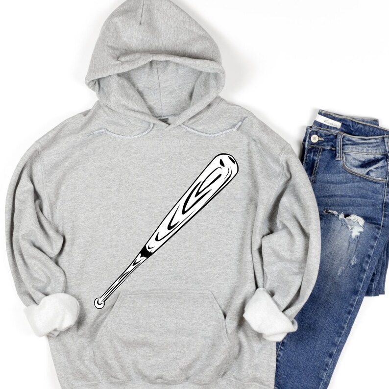 May include: A gray hooded sweatshirt with a black and white baseball bat graphic on the front.
