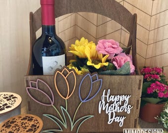 May include: A wooden gift basket with a bottle of wine, flowers, and the text "Happy Mother's Day".