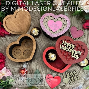 May include: A set of laser cut wooden heart-shaped boxes with different designs. One box has a red glitter finish and says "Happy Valentine's Day". Another box has a brown wood finish and says "Kiss, Hug, Love".