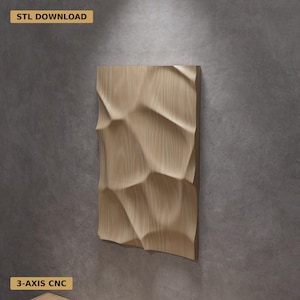 May include: A light-colored wooden panel with a textured, geometric design. The panel has a series of raised, irregular shapes. The text "STL DOWNLOAD" and "3-AXIS CNC" are visible.