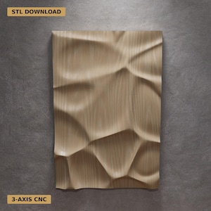 May include: A rectangular wooden panel with a textured, geometric design. The panel is light brown and features a pattern of raised, irregular shapes. The text "STL DOWNLOAD" and "3-AXIS CNC" are visible in the image.